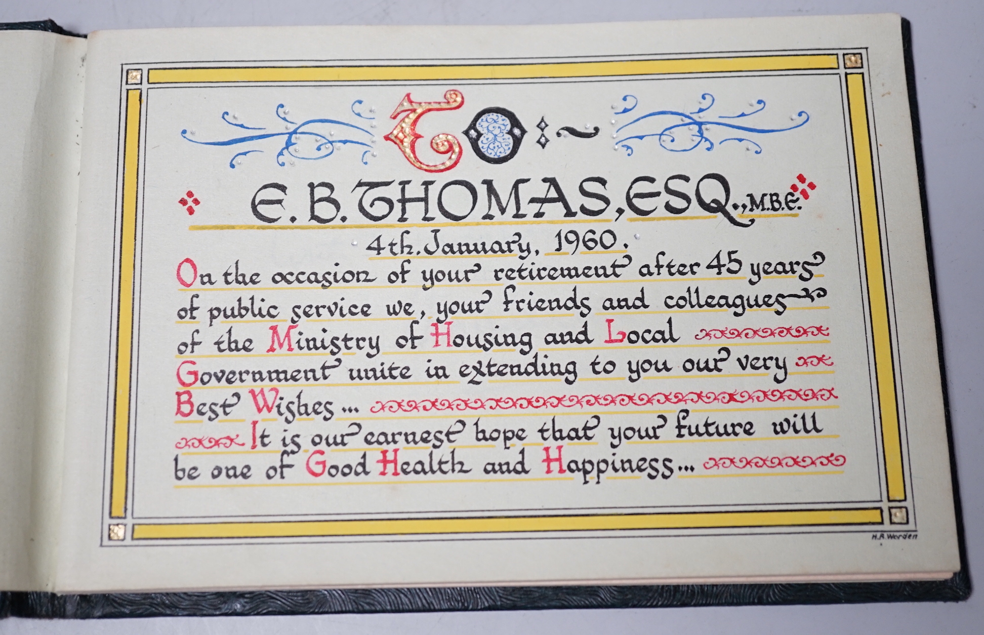 An Autograph book presented to EB Thomas esquire MBE, 4 January 1960 on the occasion of his retirement from public service with the Ministry of housing and local government, signed by his colleagues